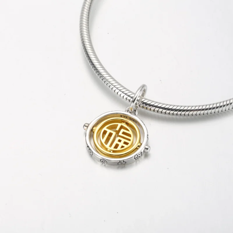 (image for) PANDORA Two-tone Fu Spinning Dangle Charm - 762536C00 - View 7